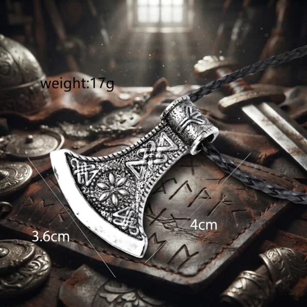 Viking axe pendant necklace in stainless steel with intricate Norse knotwork and rune detailing, shown with dimensional measurements (3.6cm x 4cm) and a weight of 17g against an atmospheric Norse warrior background.